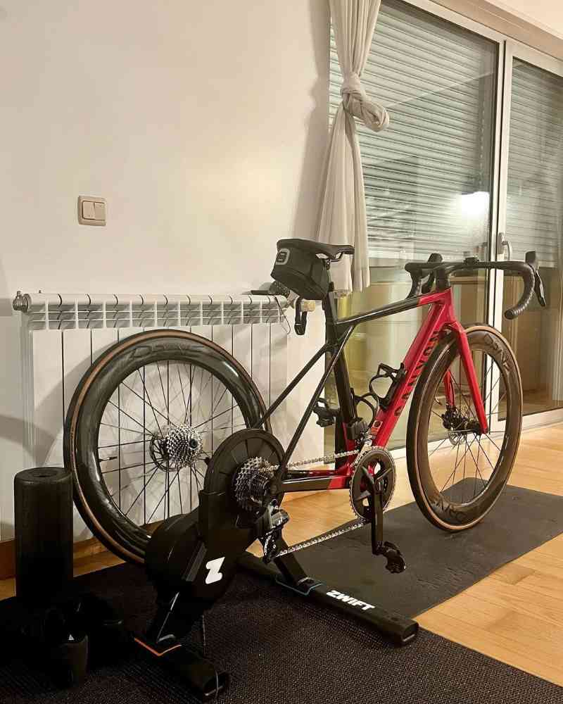jessedondrinkcola A red Canyon Ultimate road bike on a Zwift indoor trainer